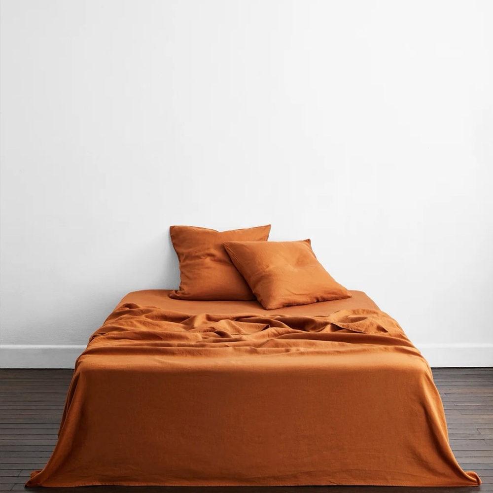 Bed threat duvet cover with 2 European size duvet pillow cases. Rust. Size king.